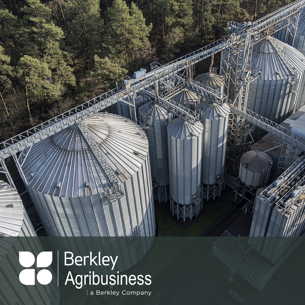Berkley Agribusiness Arial view of agribusiness manufacturing plant with silos for processing and storing agricultural products, flour, cereals and grain