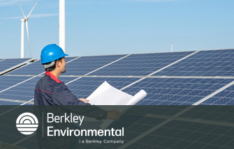 Berkley Environmental Engineer looking at plans at a solar power plant