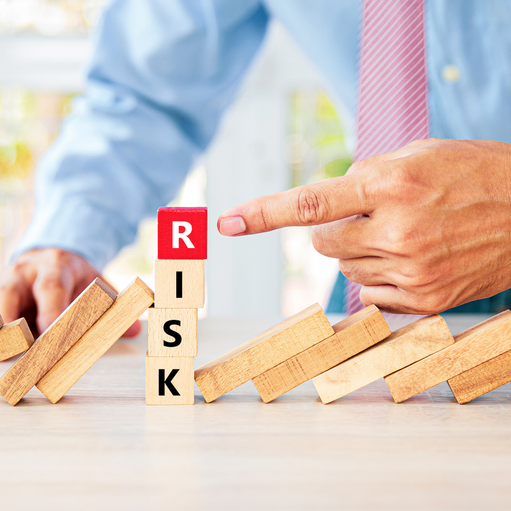 Letter blocks spell out RISK